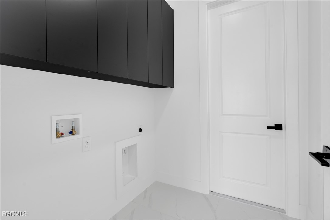 3602 20th Street Southwest Lehigh Acres, FL 33976 - Photo 35 of 40 a view of door