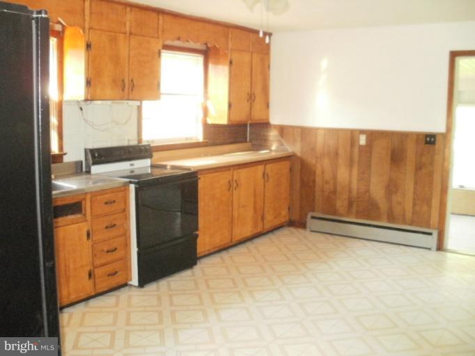 13840 Penn Shop Road Mount Airy, MD 21771 - Photo 14 of 29 a view of kitchen with granite countertop cabinets and sink