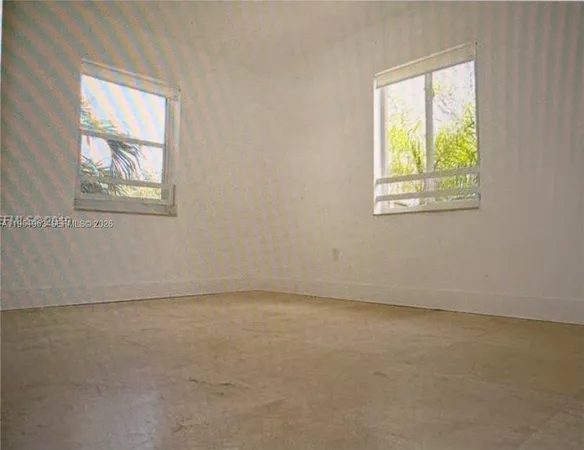 an empty room with a window