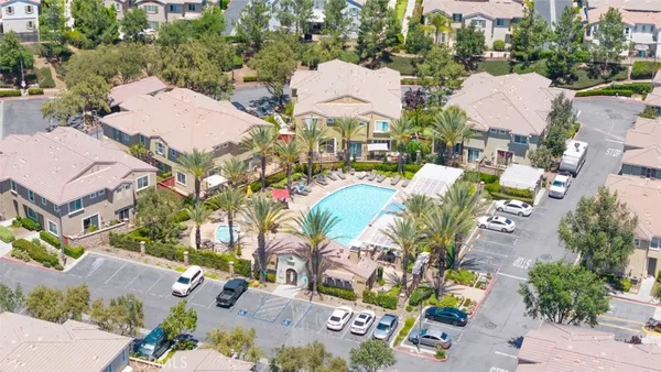 an aerial view of multiple house with yard