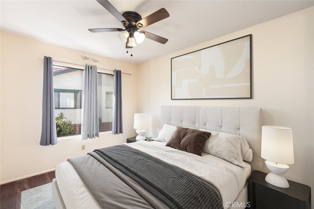 1441 Summit Drive Chula Vista, CA 91910 - Photo 15 of 29 a bedroom with a large bed and a window
