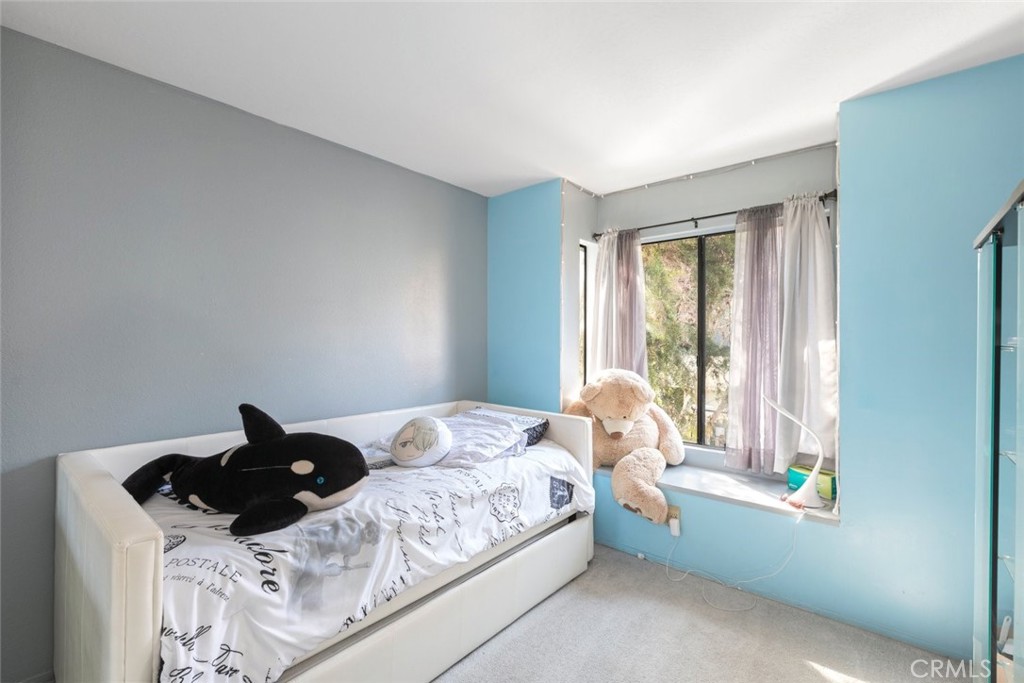 1441 Summit Drive Chula Vista, CA 91910 - Photo 16 of 29 a bedroom with a bed and a window