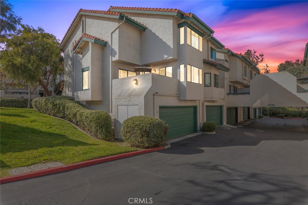 1441 Summit Drive Chula Vista, CA 91910 - Photo 2 of 29 a front view of a house with a yard