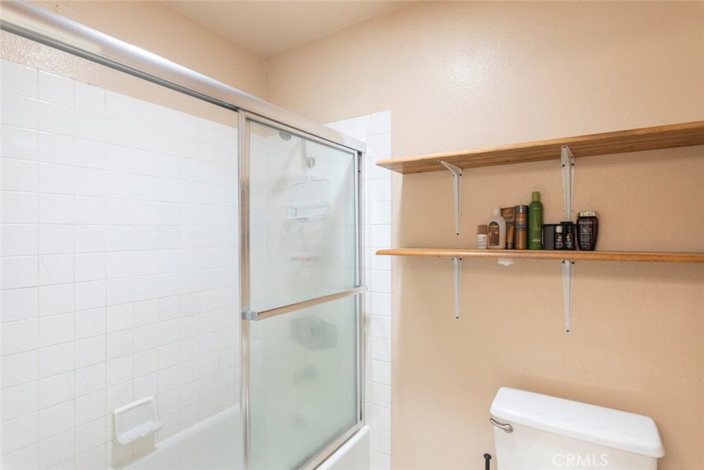 1441 Summit Drive Chula Vista, CA 91910 - Photo 22 of 29 a bathroom with a shower and a toilet