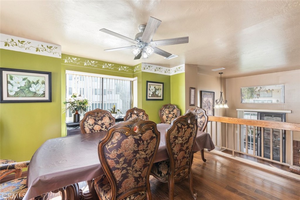 1441 Summit Drive Chula Vista, CA 91910 - Photo 9 of 29 a view of a dining room with furniture window and wooden floor
