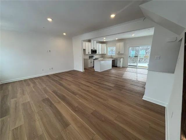 a view of kitchen with wooden floor