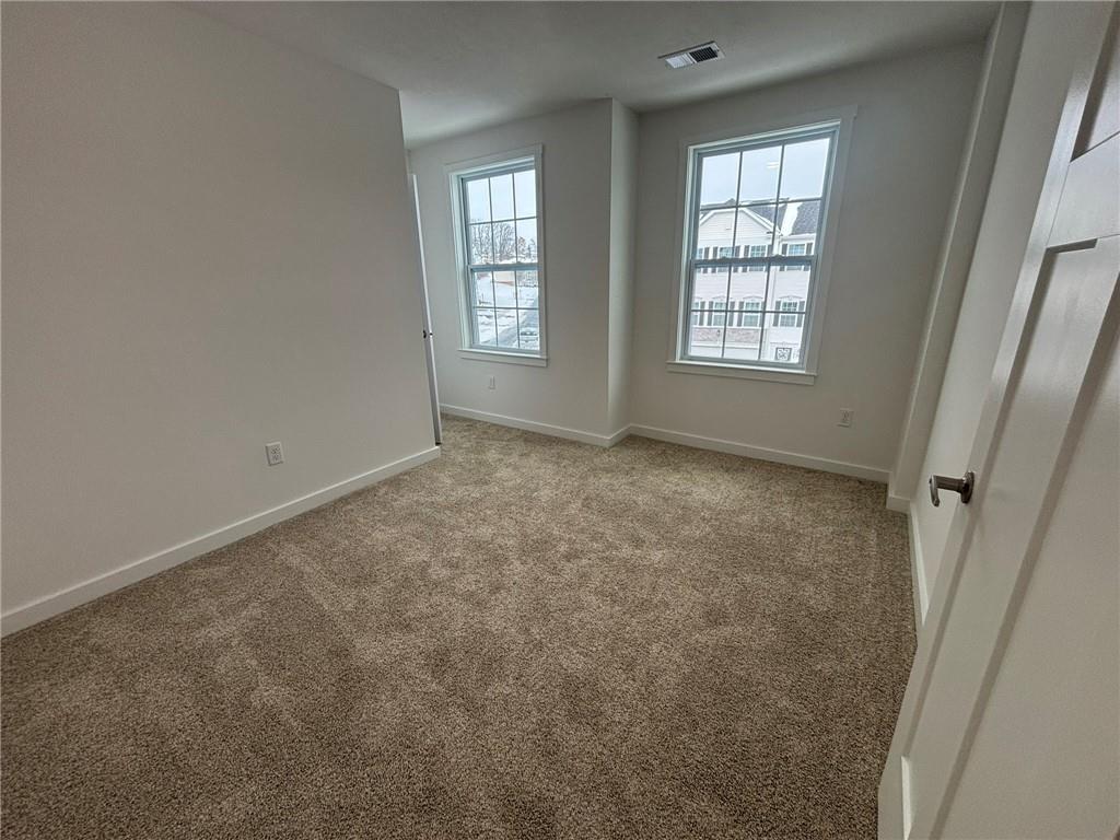 176 Lockheed Drive Coraopolis, PA 15108 - Photo 15 of 21 an empty room with windows