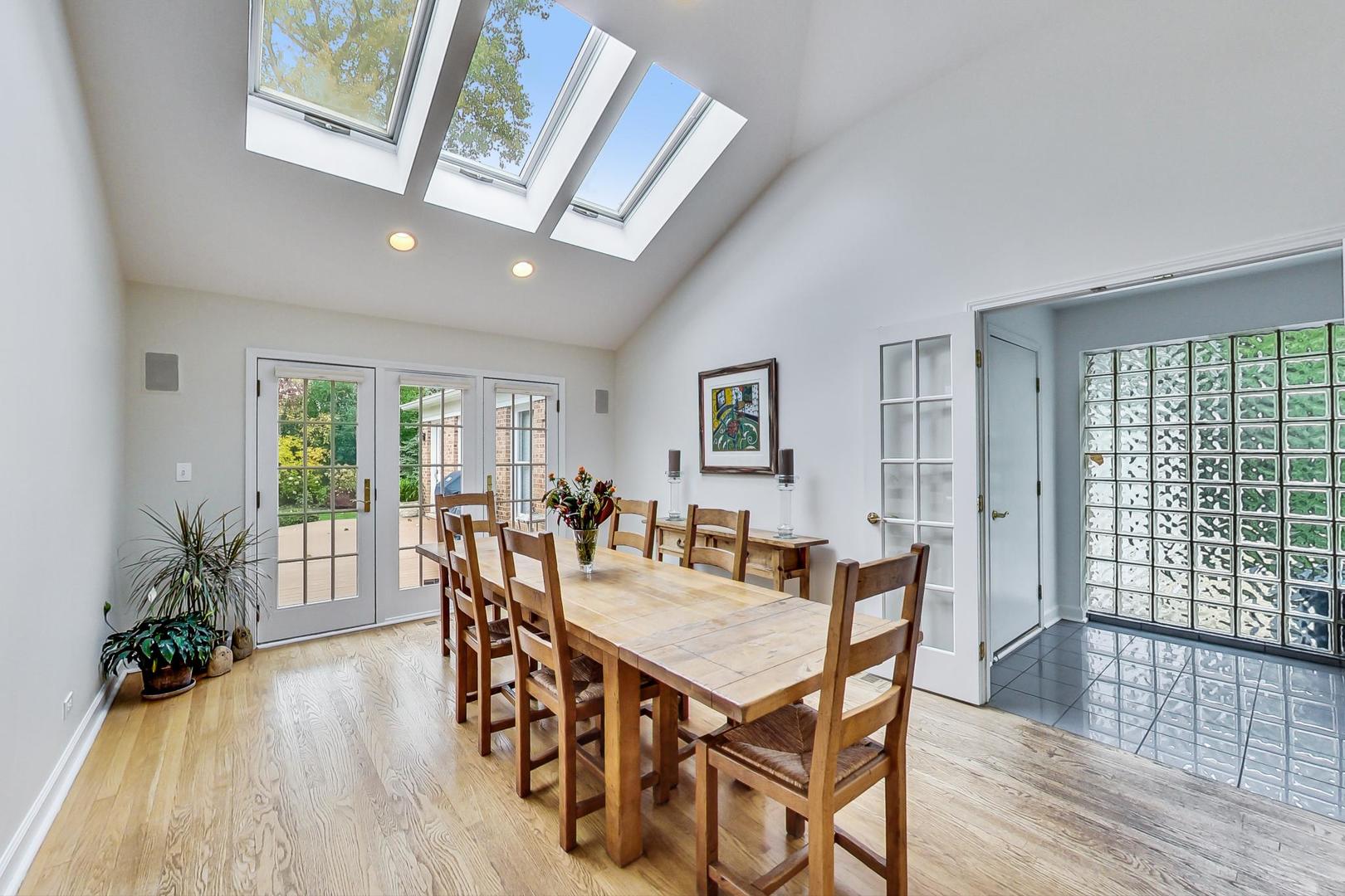 180 Westview Road Winnetka, IL 60093 - Photo 11 of 31 a view of a dining room with furniture window and wooden floor