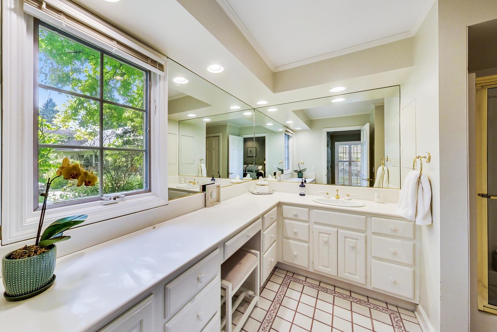 180 Westview Road Winnetka, IL 60093 - Photo 21 of 31 a large white kitchen with a large window