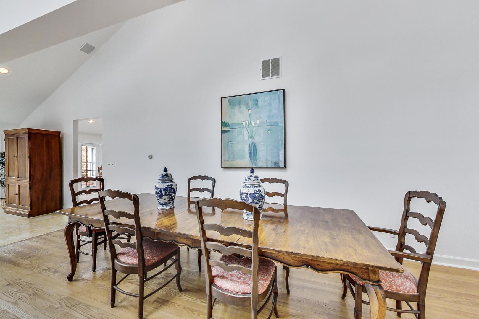 180 Westview Road Winnetka, IL 60093 - Photo 8 of 31 a view of a dining room with furniture and wooden floor