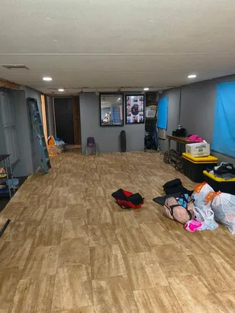 a bed room with a bed and a couch