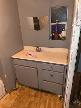 a view of living room with furniture and wooden floor