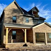 front view of a house with a street