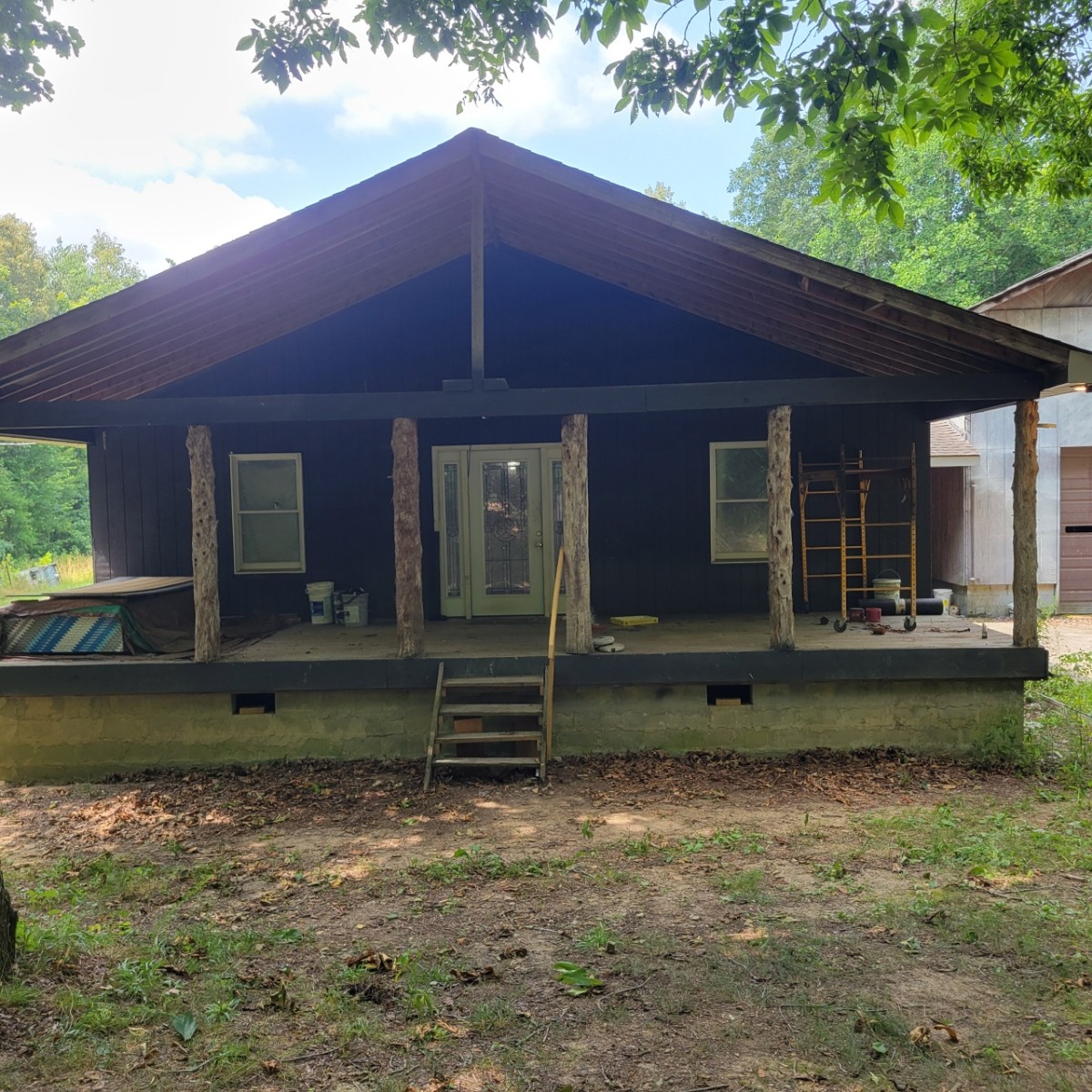 1376 Panhandle Road Manchester, TN 37355 - Photo 1 of 13 a front view of a house with a garden