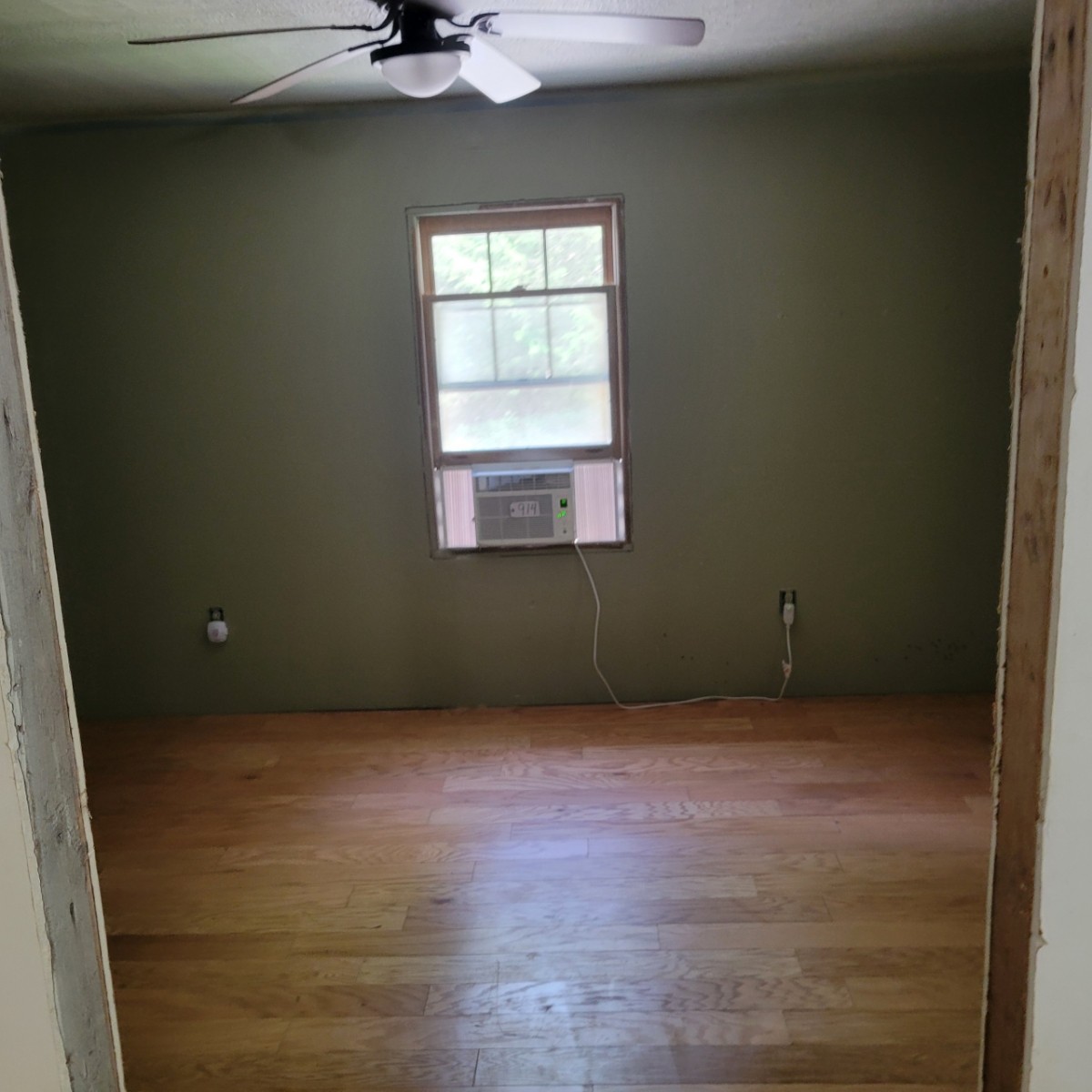 1376 Panhandle Road Manchester, TN 37355 - Photo 9 of 13 a view of an empty room with a window