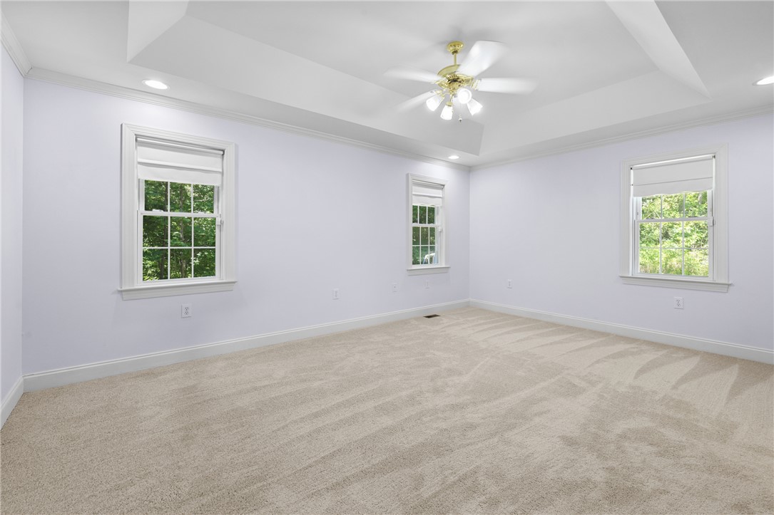 110 Brookstone Way Central, SC 29630 - Photo 21 of 46 This spacious bedroom offers ample natural light and a comfortable, inviting atmosphere.