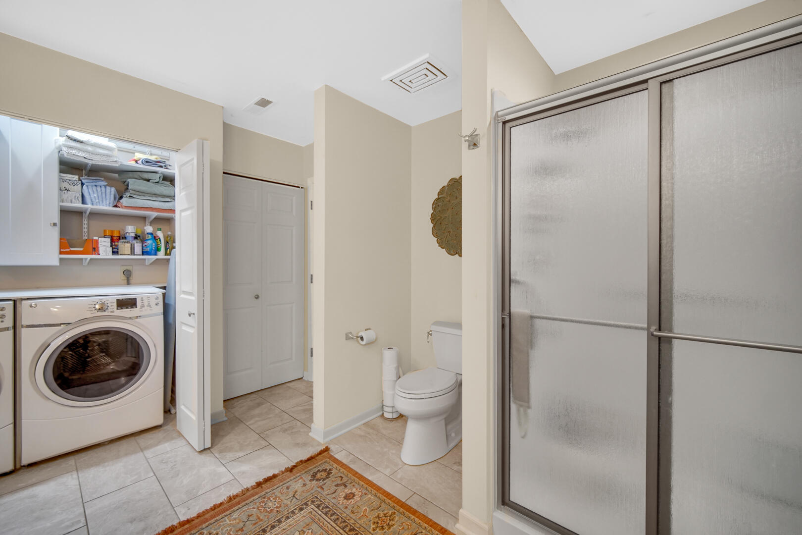 910 Ridge Road, Unit 405 Munster, IN 46321 - Photo 18 of 37 a bathroom with a shower and a toilet