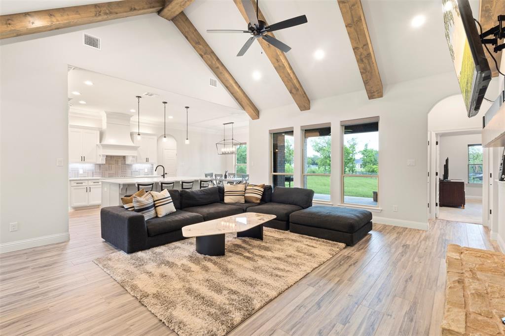 105 Clayton Crossing Springtown, TX 76082 - Photo 5 of 40 a living room with furniture and a large window
