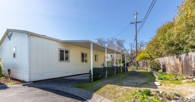a view of a house with a patio