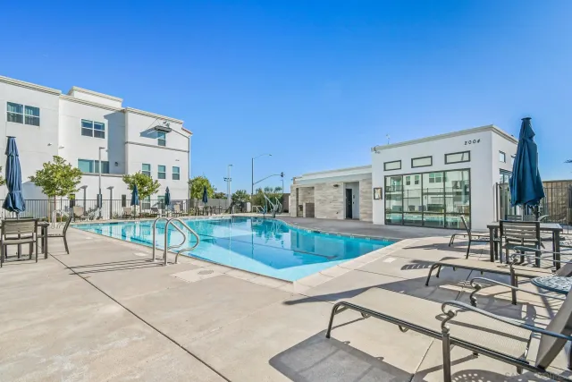 a view of a chairs and table in the patio