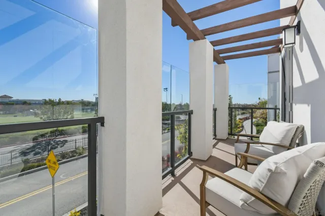 a view of a street with a building in the background