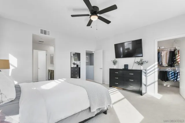 a bathroom with a double vanity sink mirror and double