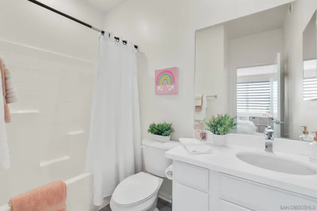 a view of a building with a street