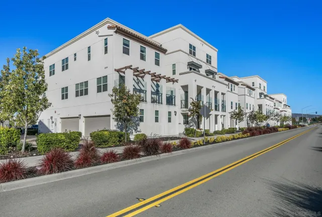 a view of a building with a street