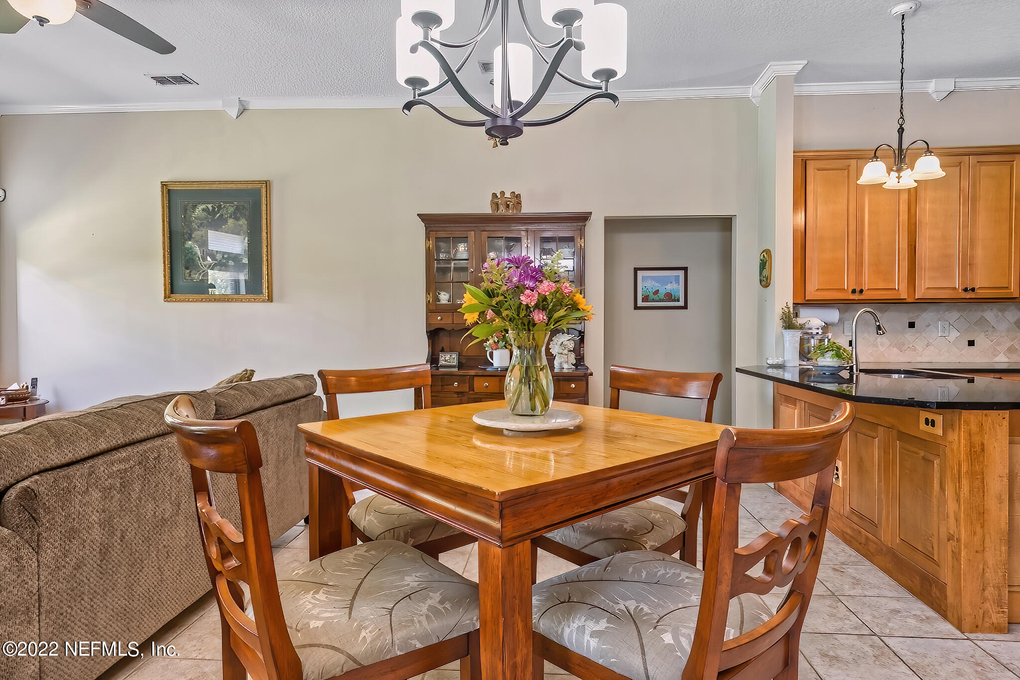 855 East Red House Branch Road St. Augustine, FL 32084 - Photo 12 of 43 a view of a dining room with furniture
