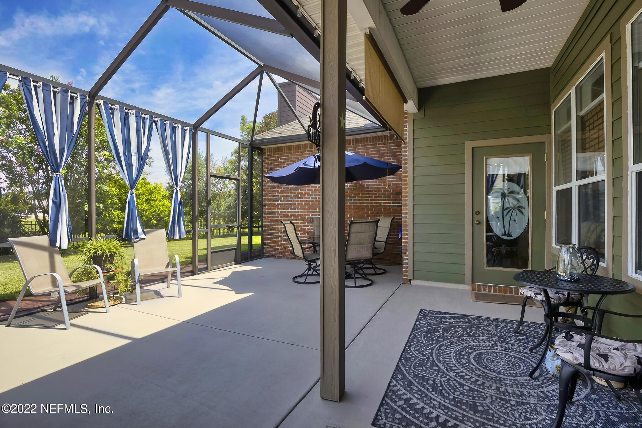 855 East Red House Branch Road St. Augustine, FL 32084 - Photo 17 of 43 a view of an chairs and tables in the patio