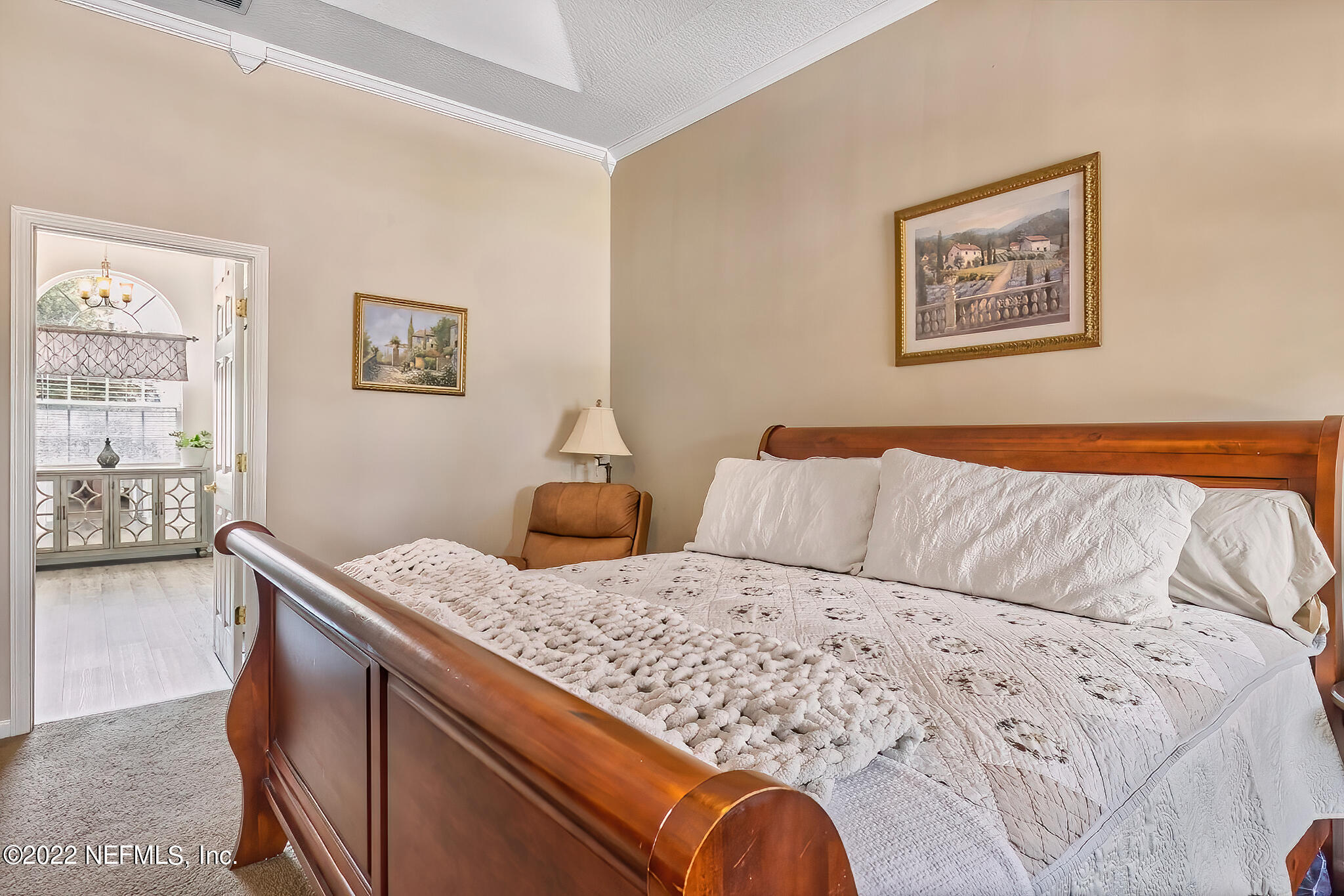 855 East Red House Branch Road St. Augustine, FL 32084 - Photo 20 of 43 a living room with a bed and furniture