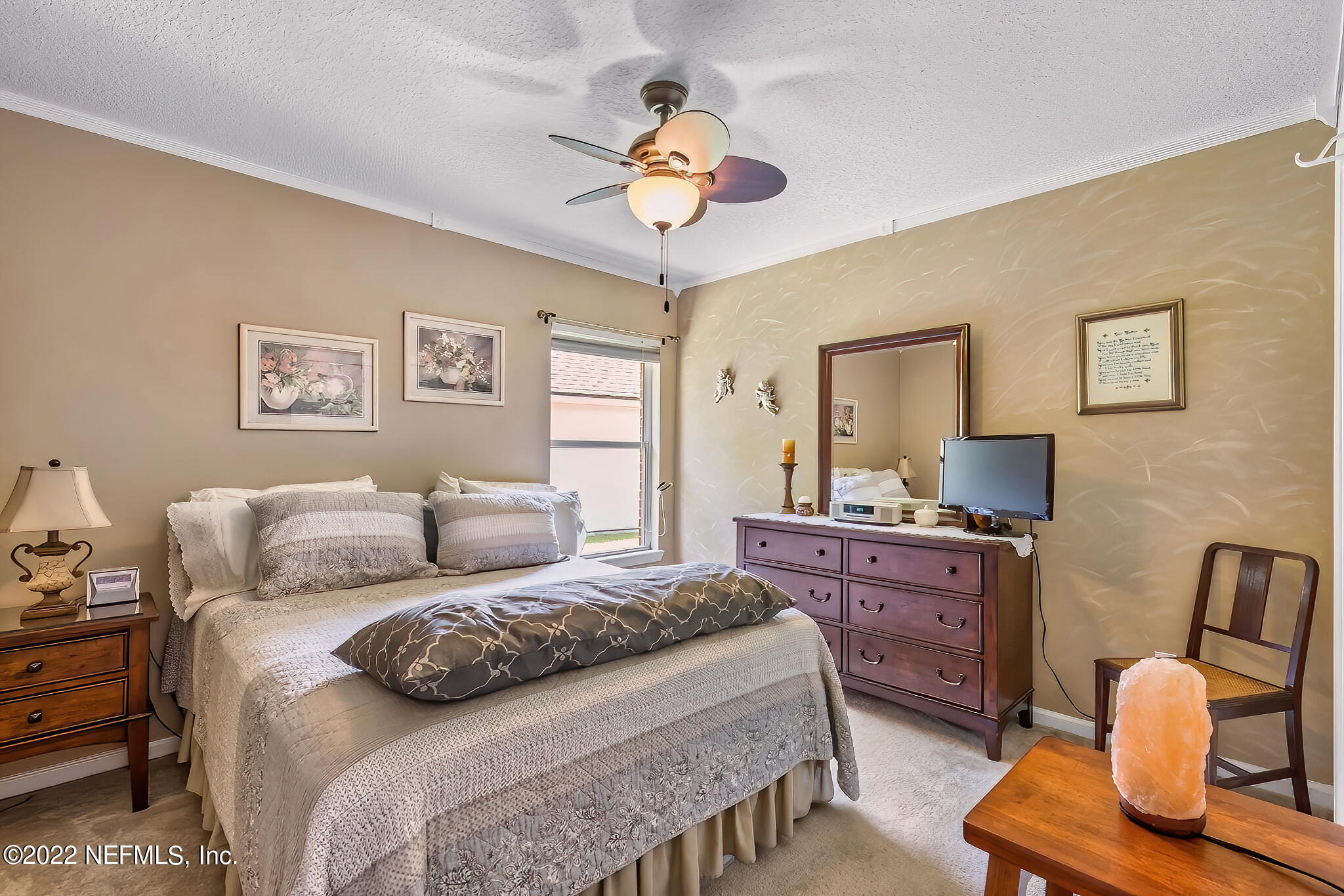 855 East Red House Branch Road St. Augustine, FL 32084 - Photo 24 of 43 a bedroom with a bed and furniture