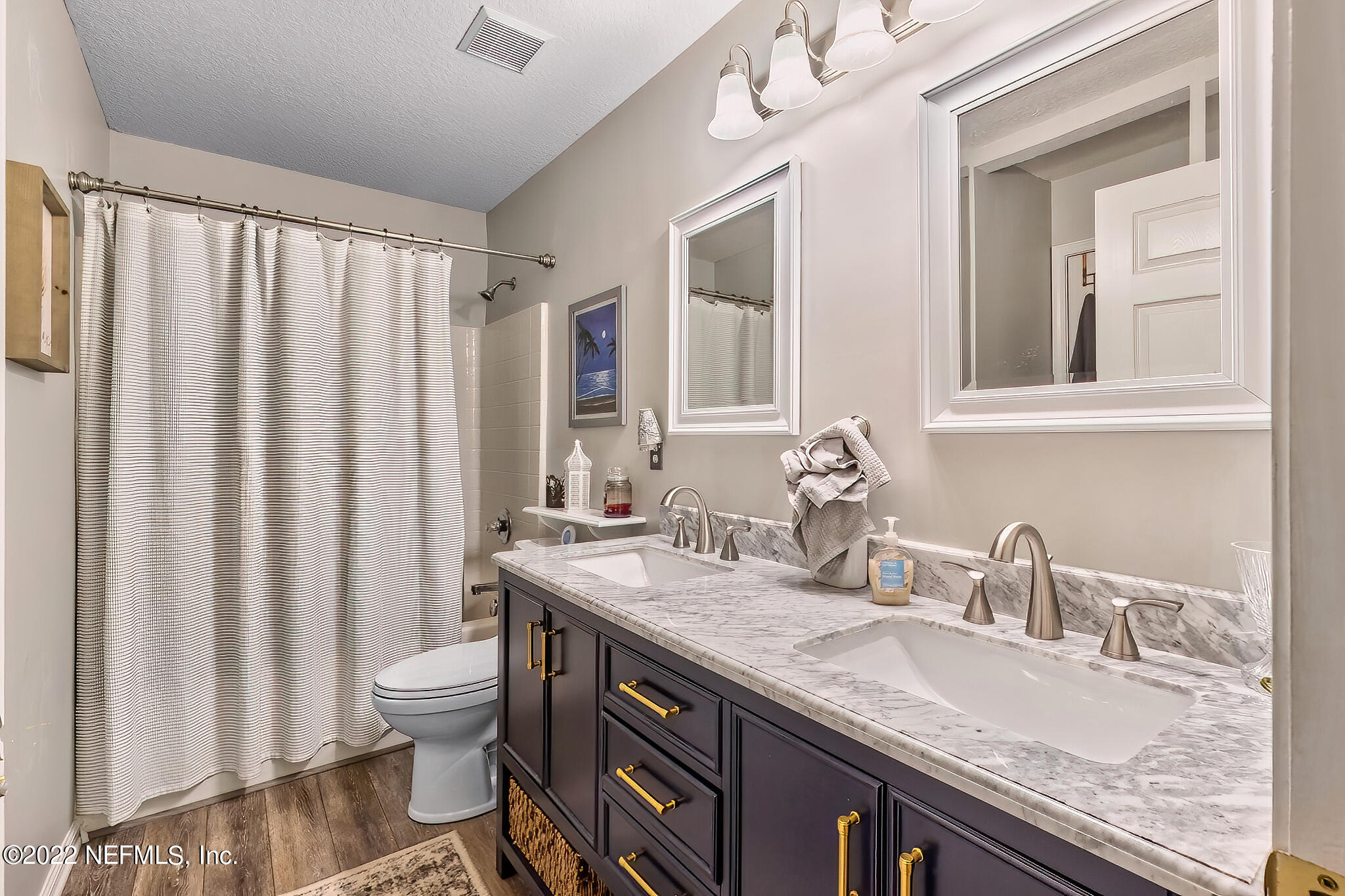 855 East Red House Branch Road St. Augustine, FL 32084 - Photo 30 of 43 a bathroom with a granite countertop sink and a mirror