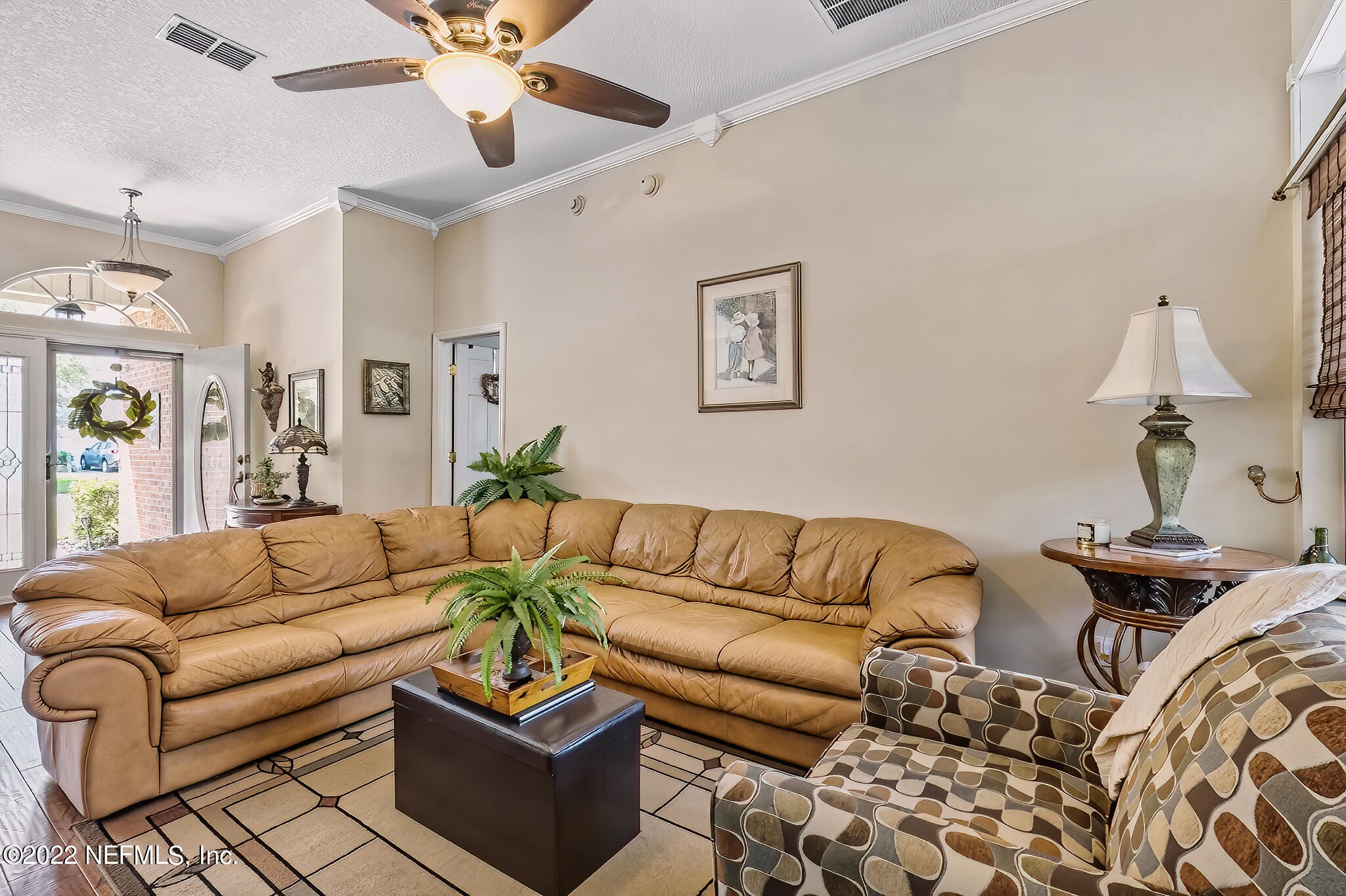 855 East Red House Branch Road St. Augustine, FL 32084 - Photo 7 of 43 a living room with furniture and wooden floor
