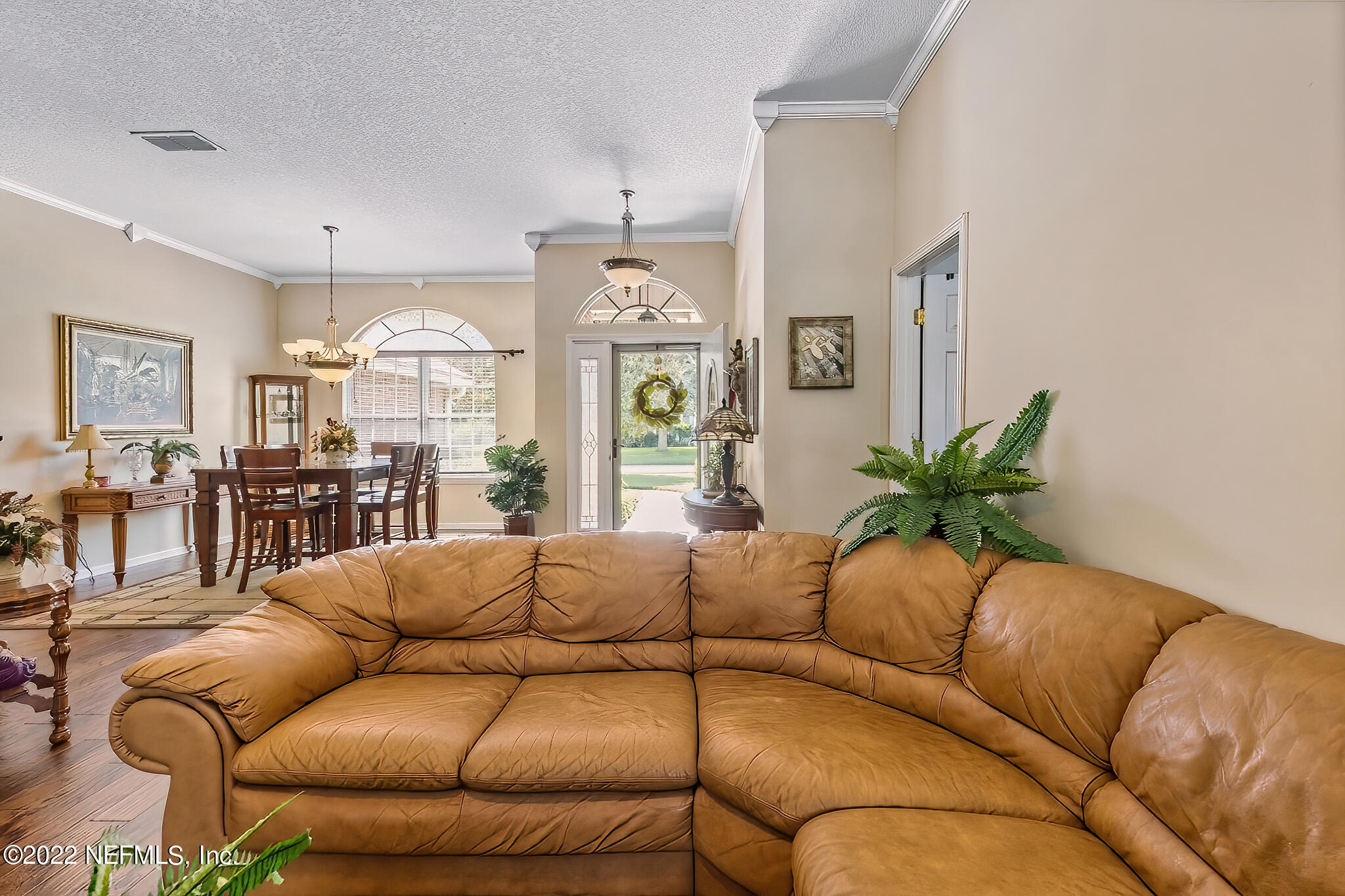 855 East Red House Branch Road St. Augustine, FL 32084 - Photo 8 of 43 a living room with furniture kitchen and a large window