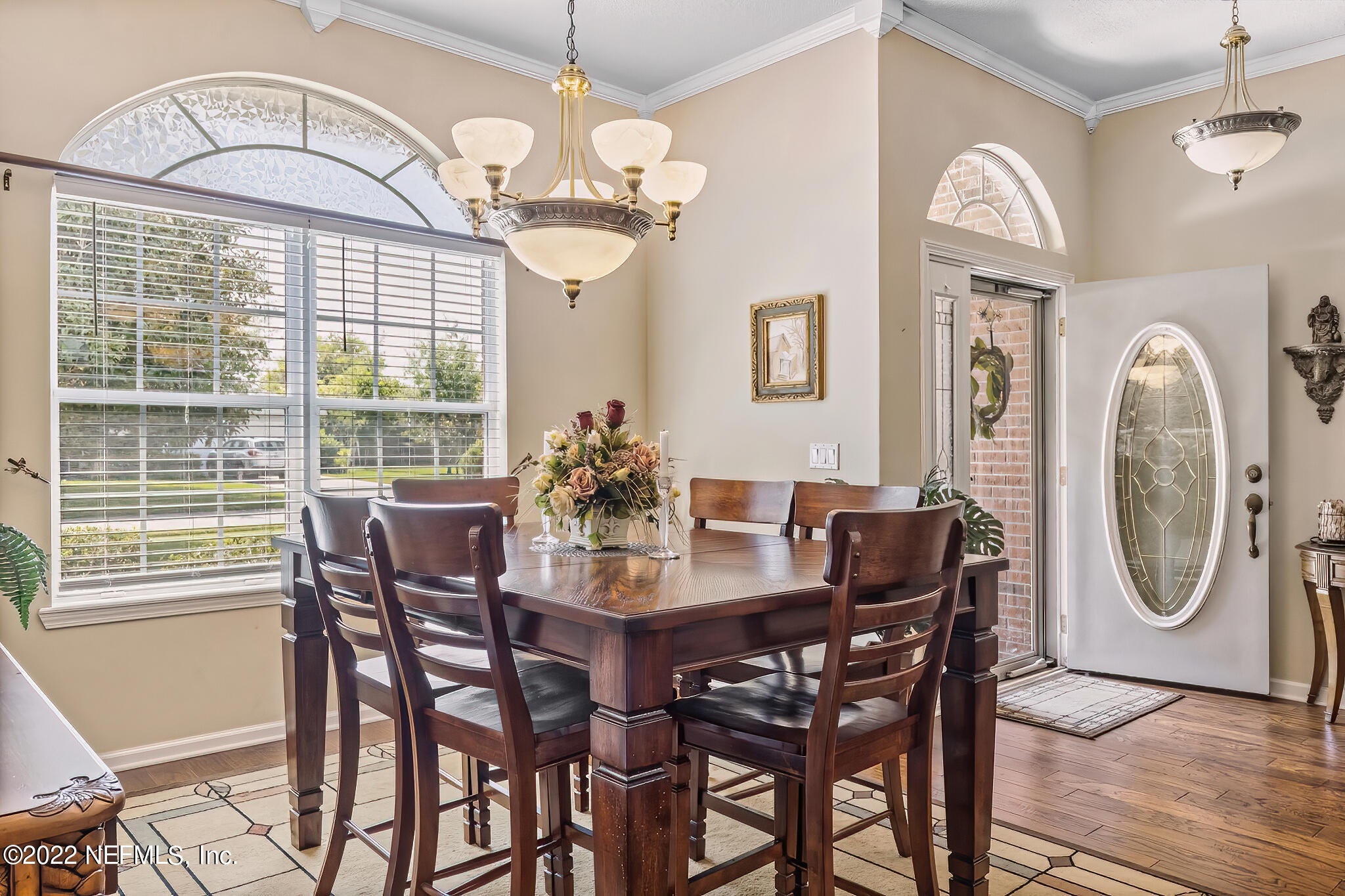 855 East Red House Branch Road St. Augustine, FL 32084 - Photo 9 of 43 a view of a dining room with furniture window and wooden floor