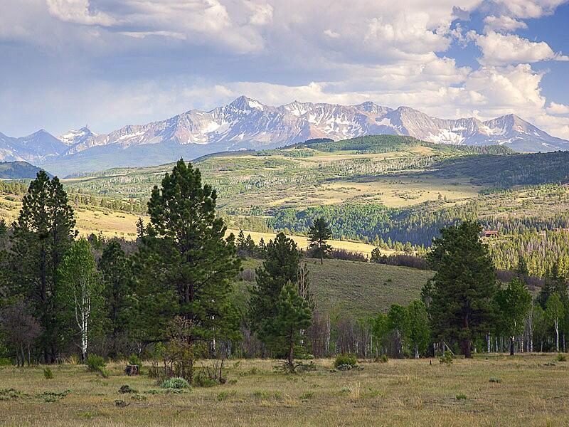 484 Gutshall Lane Placerville, CO 81430 - Photo 2 of 32 a view of a town with an ocean beach