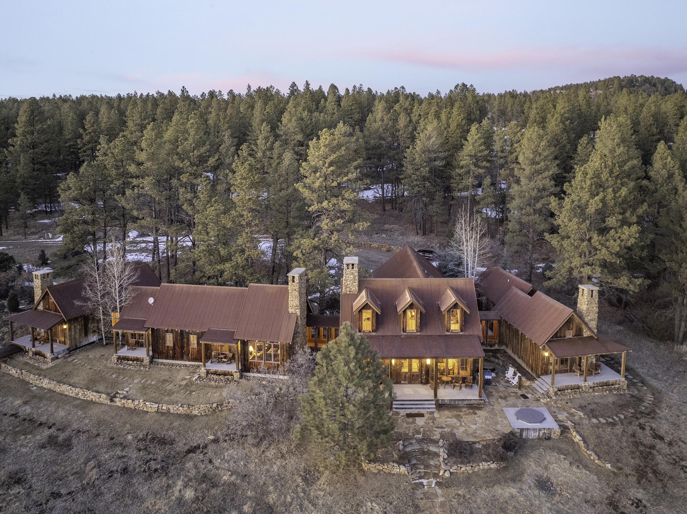 484 Gutshall Lane Placerville, CO 81430 - Photo 30 of 32 a view of a fire pit with a mountain in the background