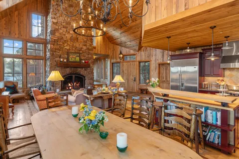 a outdoor living space with patio furniture and a fireplace