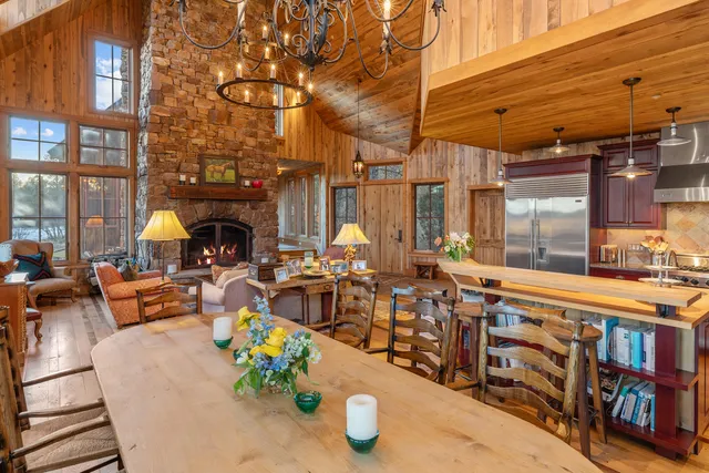 a outdoor living space with patio furniture and a fireplace