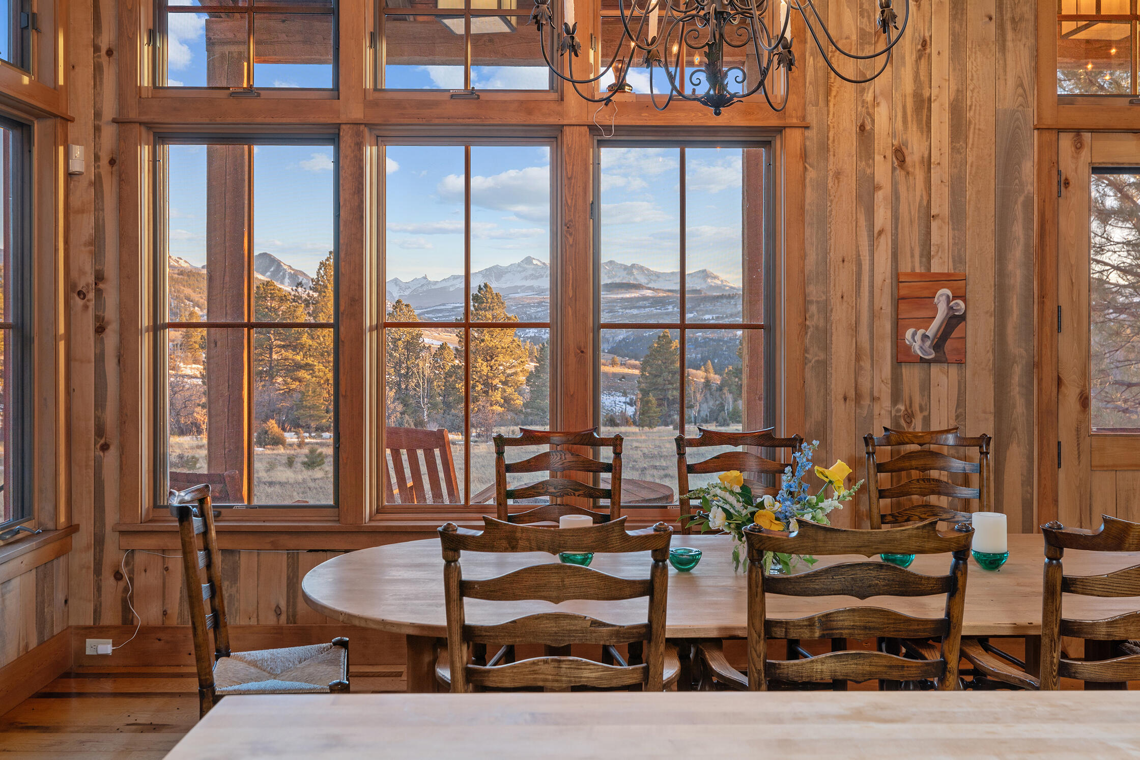 484 Gutshall Lane Placerville, CO 81430 - Photo 8 of 32 a dining room with furniture and wooden floor