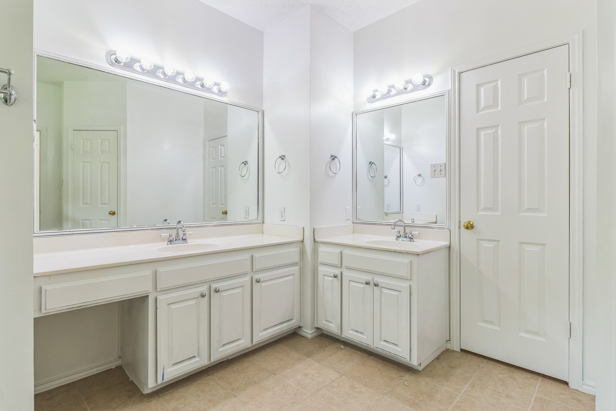 800 Mountain Ridge Drive Leander, TX 78641 - Photo 16 of 31 Ample cabinetry and dual sinks define this practical bathroom space.