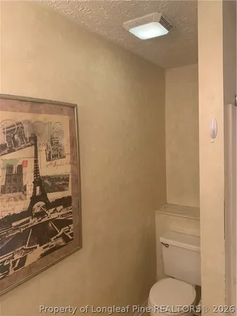 a bathroom with a toilet