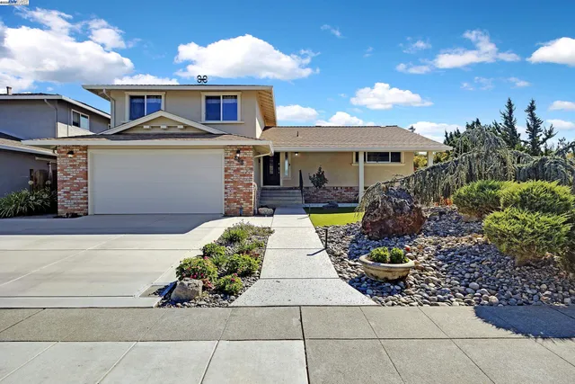 a view of a house with patio