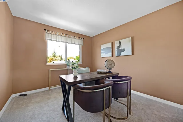 a dining room with table and chair