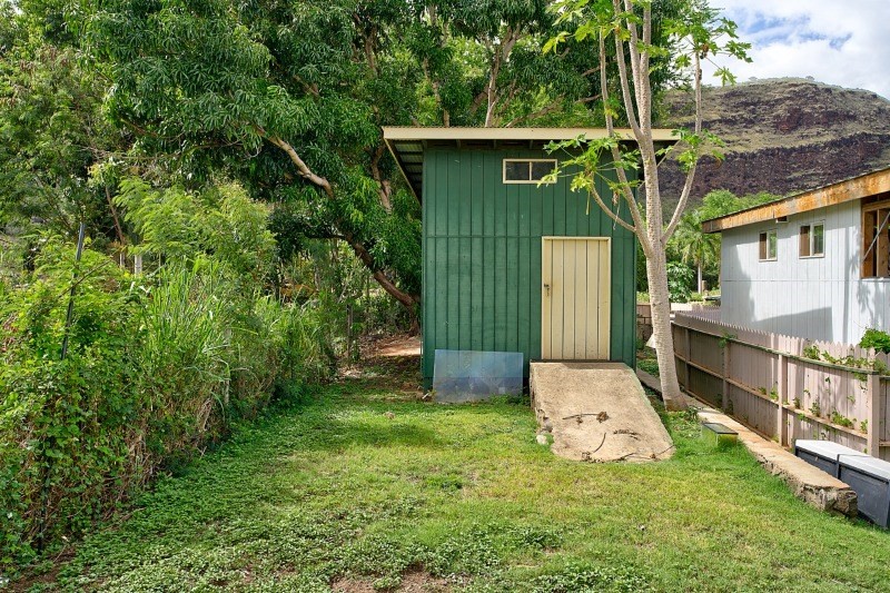 4909 Menehune Road, Unit 2 Waimea, HI 96796 - Photo 11 of 13 a view of backyard with a garden and plants