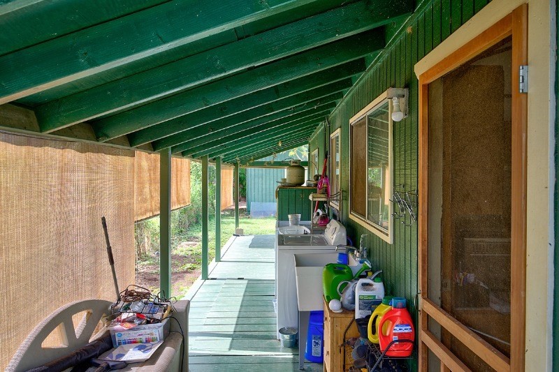 4909 Menehune Road, Unit 2 Waimea, HI 96796 - Photo 4 of 13 a view of swimming pool with outdoor seating