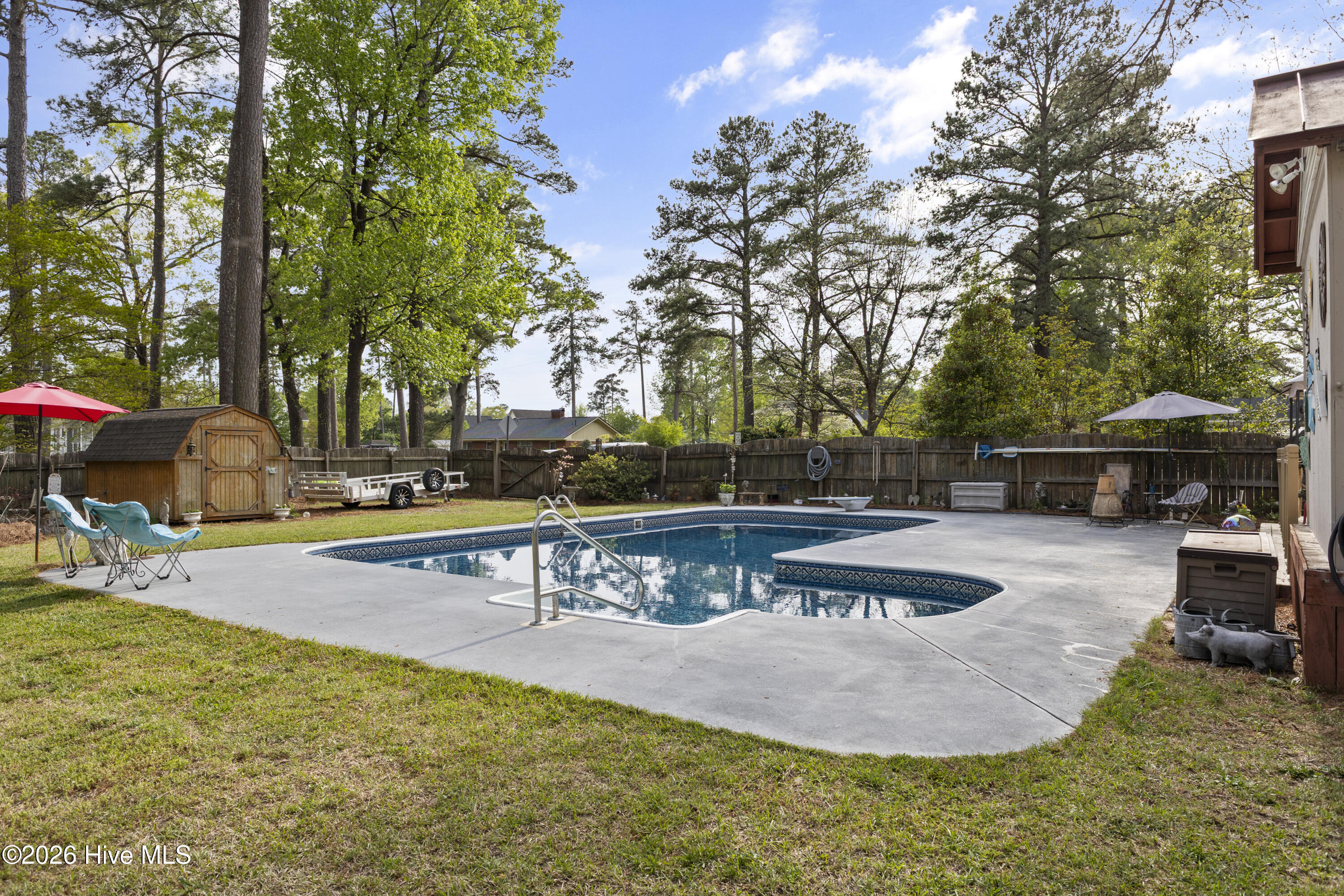 1721 Bethlehem Road Rocky Mount, NC 27803 - Photo 1 of 46 Beautiful large in-ground L-shaped salt water pool