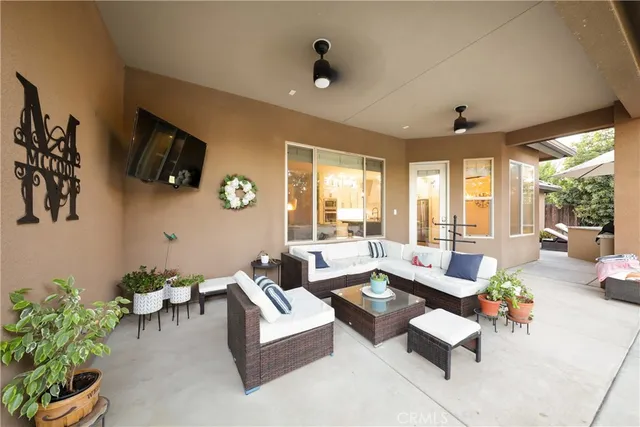 a living room with furniture and a window