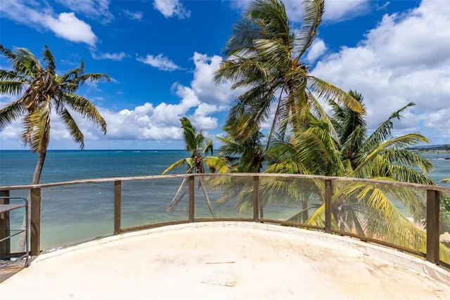 an aerial view of a houses with outdoor space